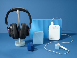 The Lenire tinnitus treatment device with headphones and tongue stimulator.